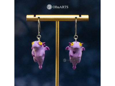 Earrings with a cute purple dragon