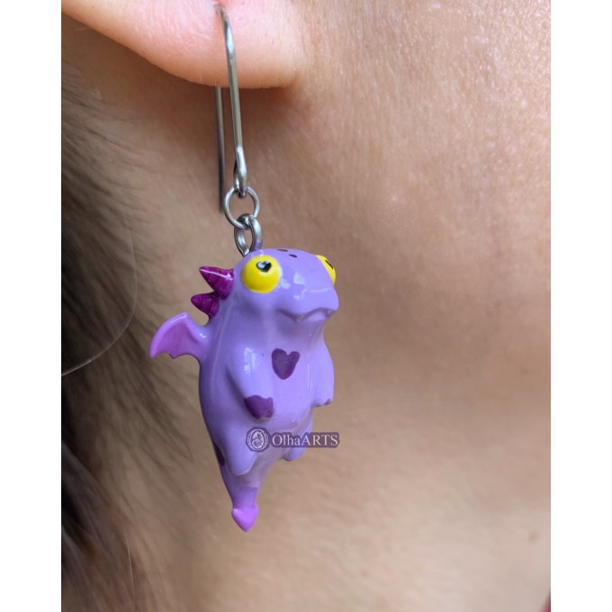 Earrings with a cute purple dragon