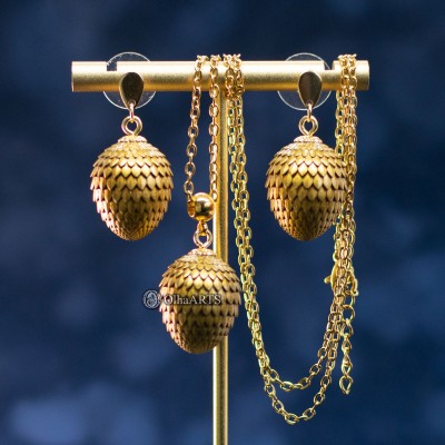 Set of Jewelry Golden Dragon Eggs. Pendant and Earrings