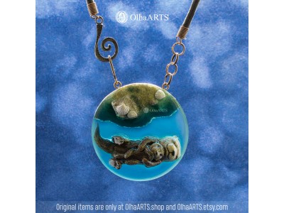 Pendant with Swimming Otters