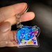 Keychain blue dragon with comic book